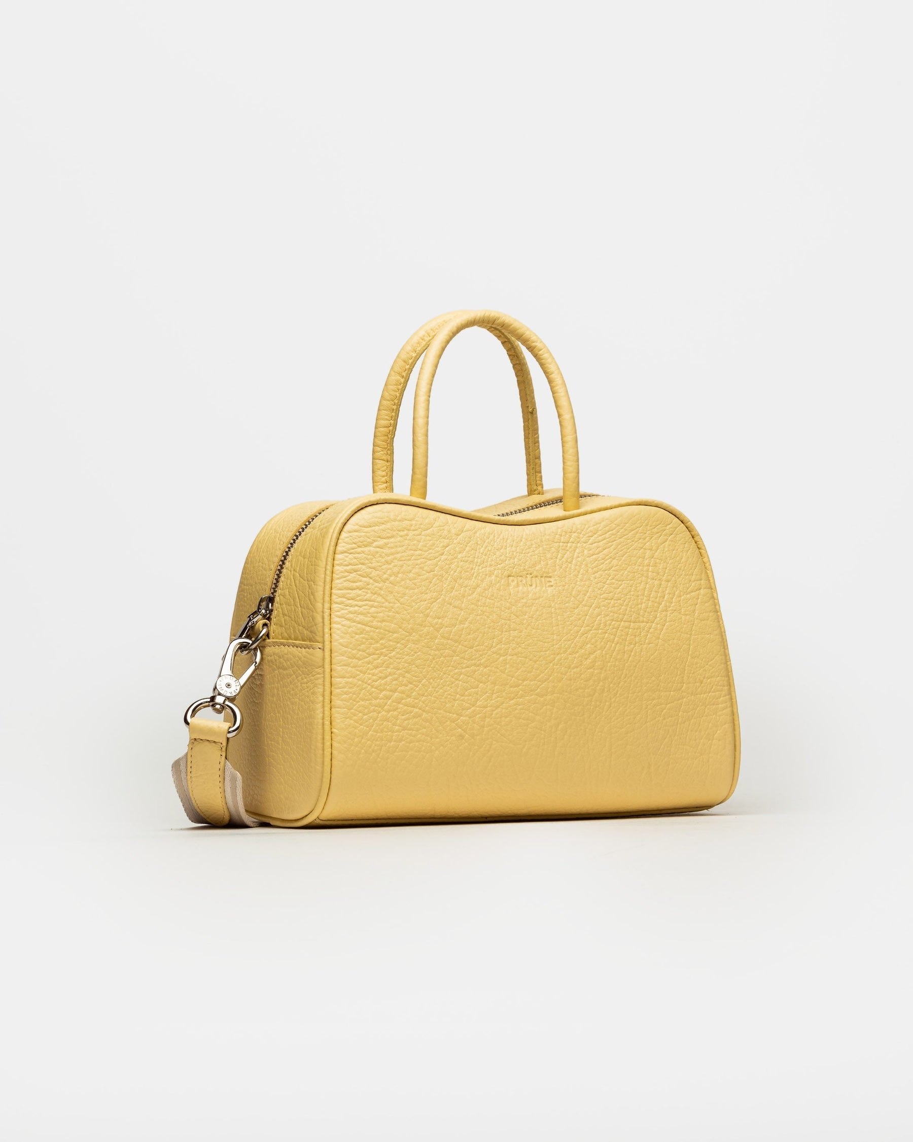 CARTERA DE MANO THE CLUB EN CUERO GRANEADO